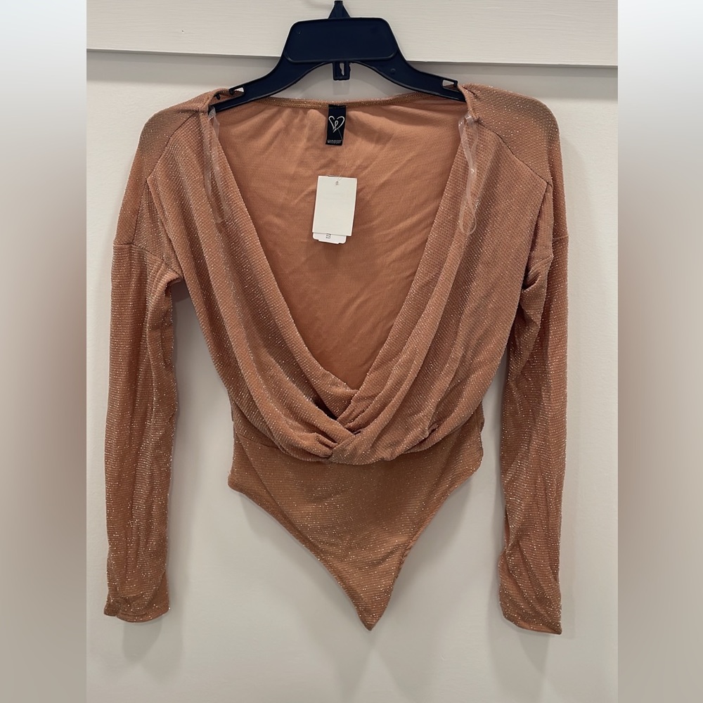 New with tags women’s bodysuit